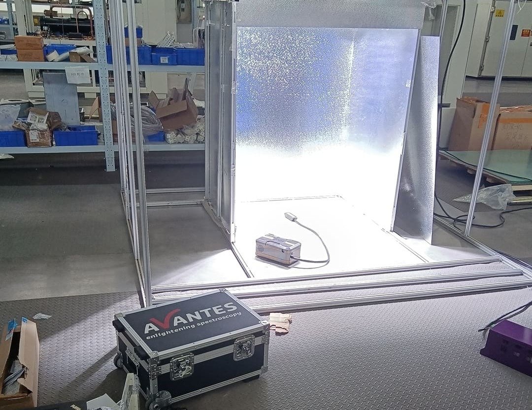 An old, heavy magnetic ballast on a workshop bench